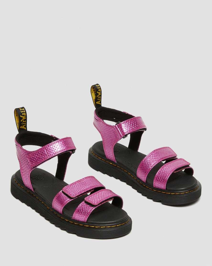 pinke dr. martens klaire kindersandalen mit reptilienmuster und riemen