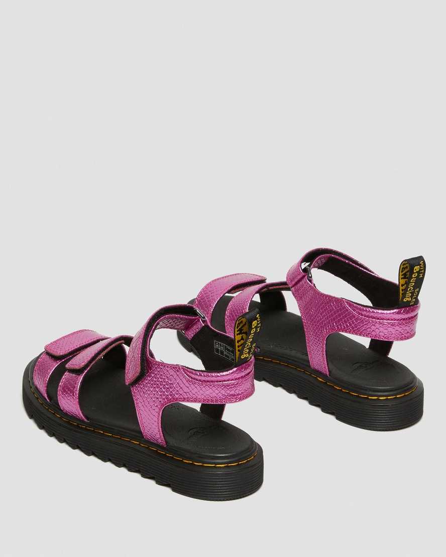 pinke dr. martens klaire kindersandalen mit reptilienmuster und riemen