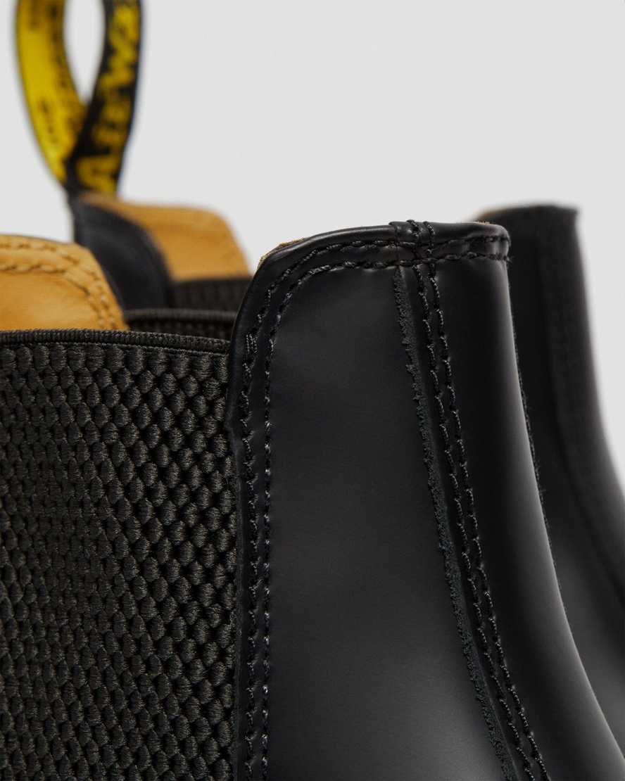 schwarze dr. martens 2976 chelsea boots mit gelben nähten für herren