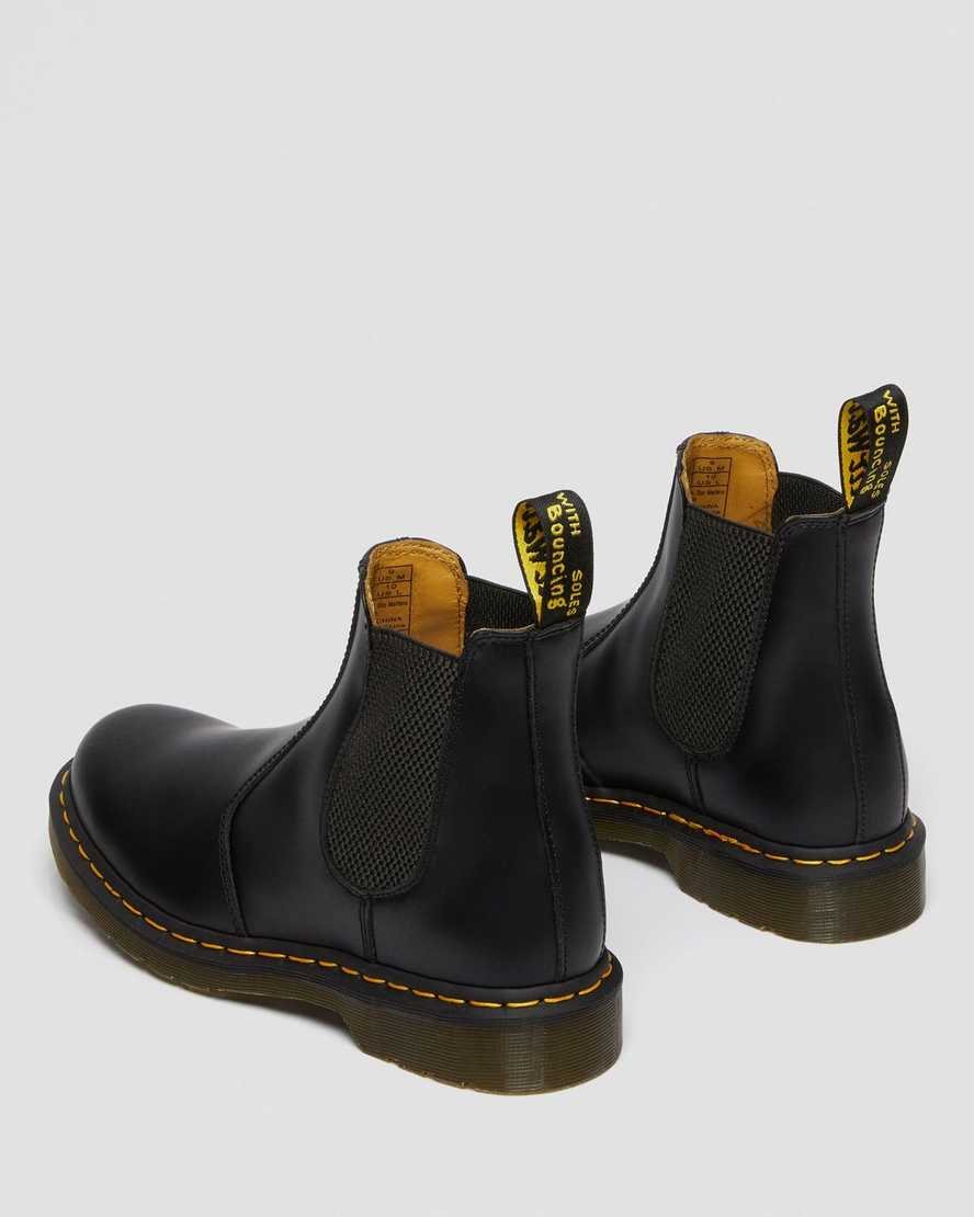 schwarze dr. martens 2976 chelsea boots mit gelben nähten für herren