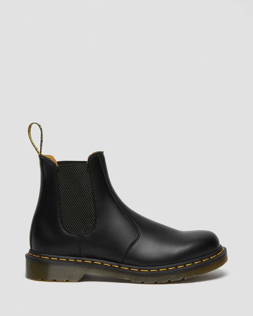 schwarze dr. martens 2976 chelsea boots mit gelben nähten für herren