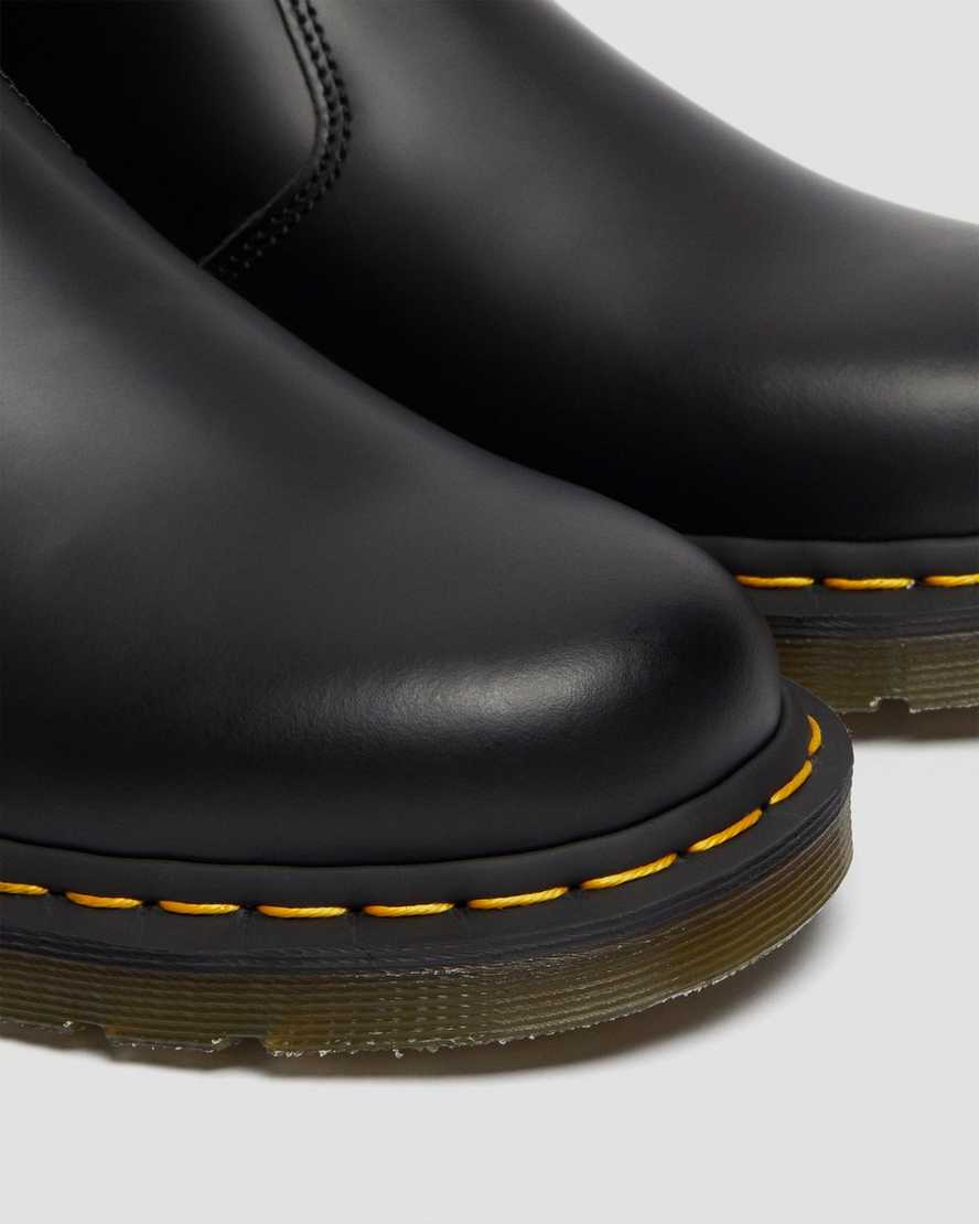 schwarze dr. martens 2976 chelsea boots mit gelben nähten für herren