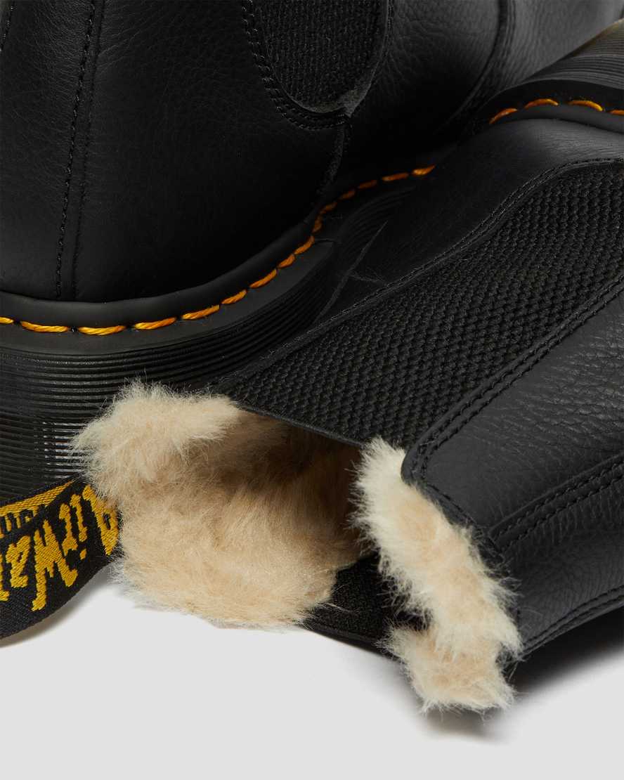 schwarze dr. martens 2976 chelsea boots mit kunstfellfutter und plateau für herren