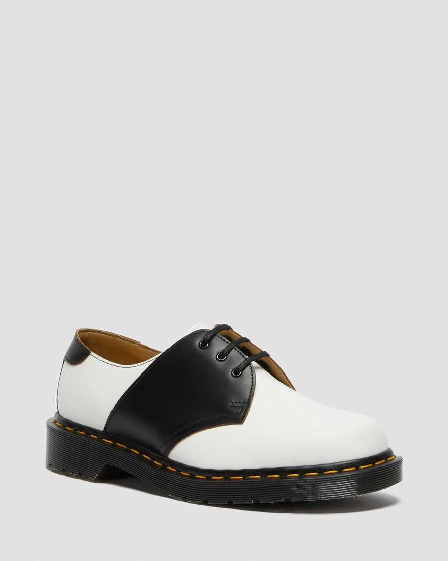 weiße und schwarze dr. martens 1461 herren-sattelschuhe