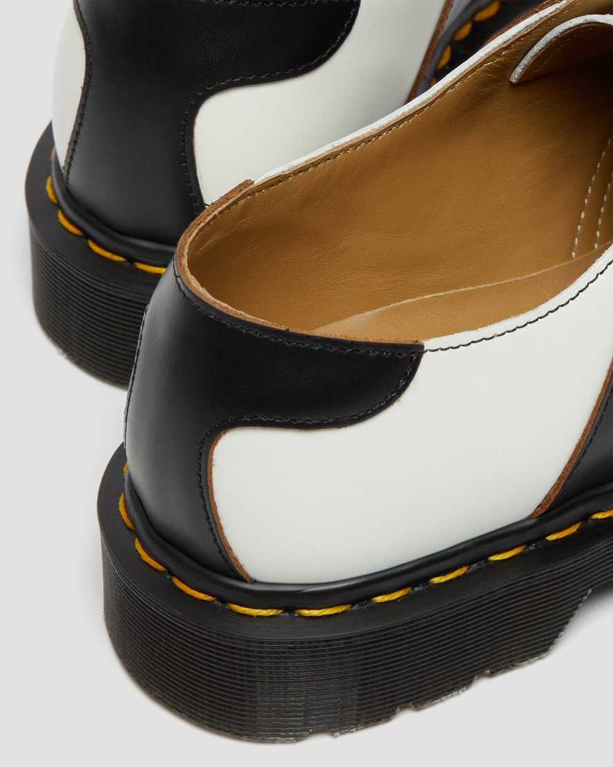 weiße und schwarze dr. martens 1461 herren-sattelschuhe