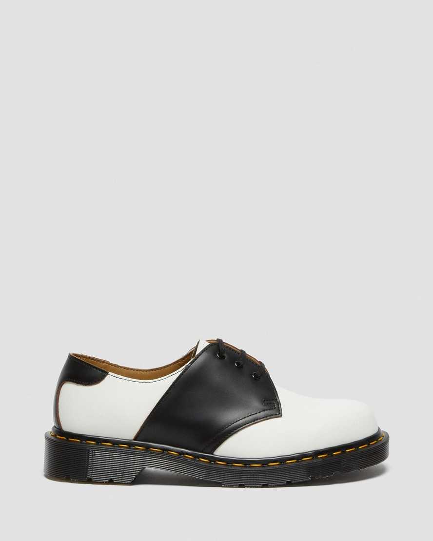 weiße und schwarze dr. martens 1461 herren-sattelschuhe