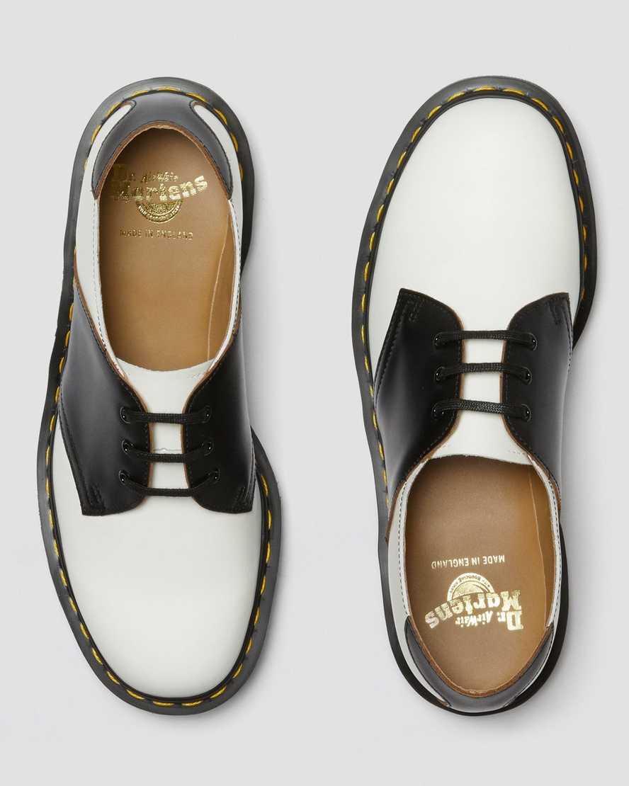 weiße und schwarze dr. martens 1461 herren-sattelschuhe