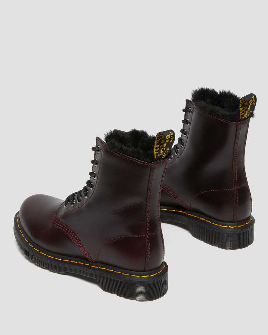 burgunderrote dr. martens 1460 serena schnürstiefel für damen mit kunstfellfutter.