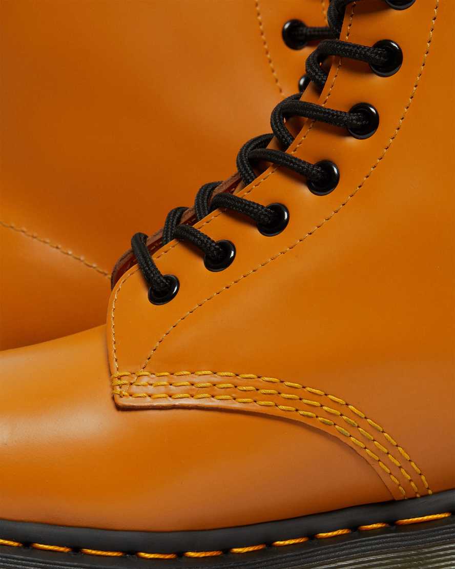 orangefarbene dr. martens 1460 smooth damen-schnürstiefel