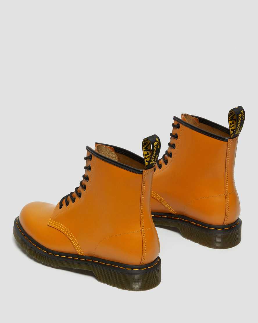 orangefarbene dr. martens 1460 smooth damen-schnürstiefel