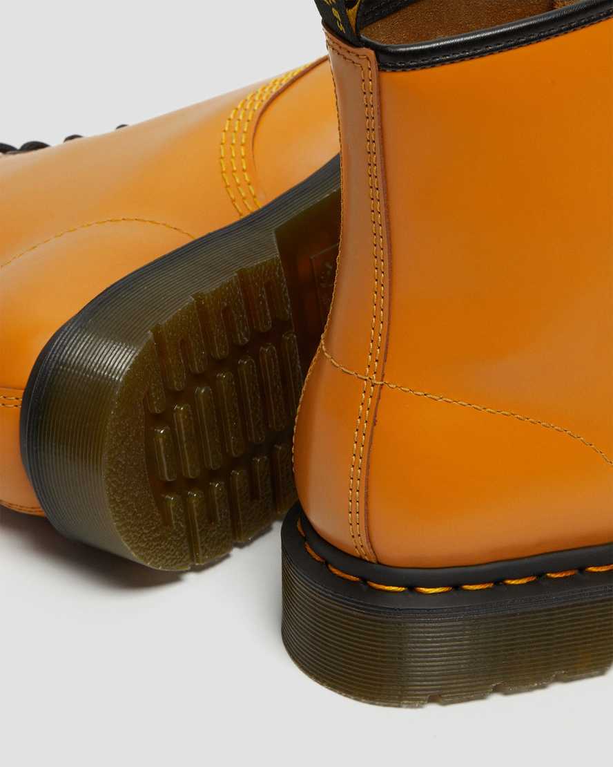 orangefarbene dr. martens 1460 smooth damen-schnürstiefel