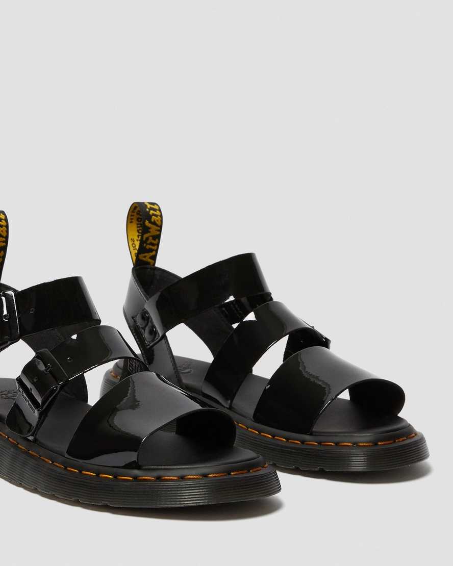schwarze dr. martens gryphon lack-gladiator-sandalen für damen