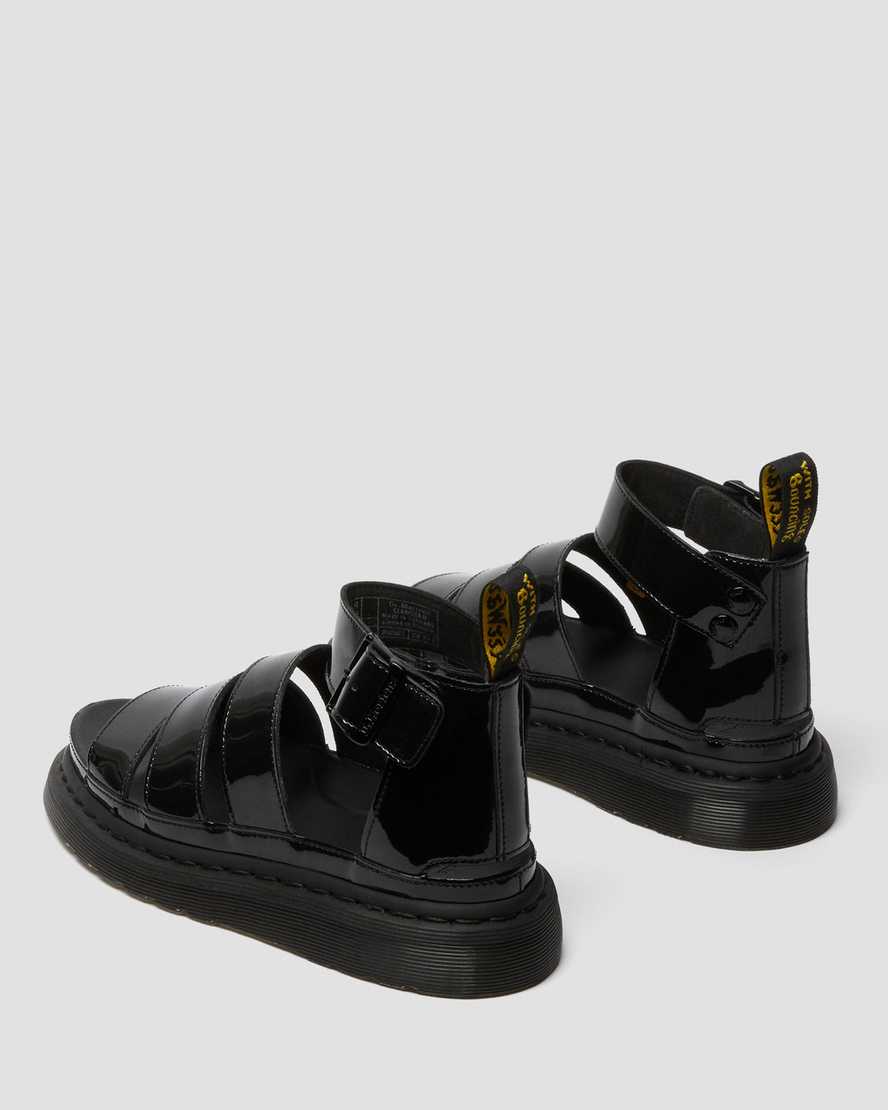 schwarze dr. martens clarissa ii lackleder-sandalen für damen mit riemen