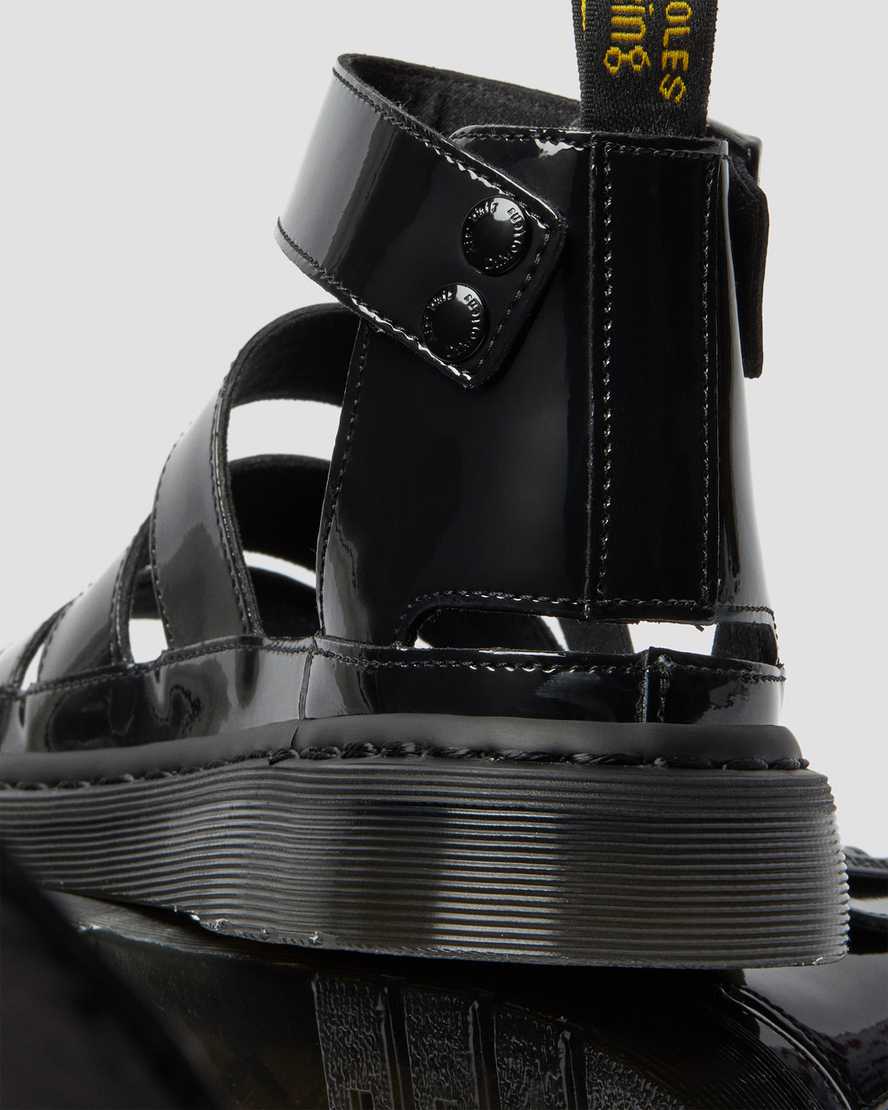 schwarze dr. martens clarissa ii lackleder-sandalen für damen mit riemen