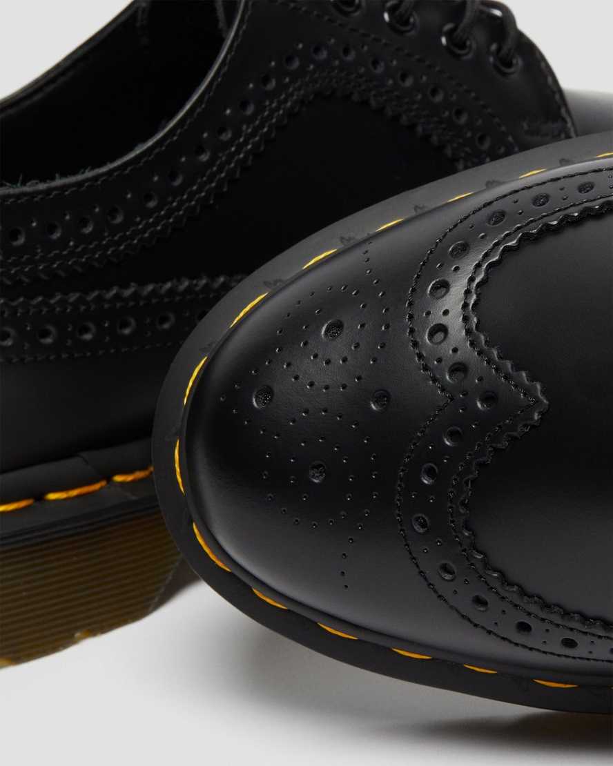 schwarze dr. martens 3989 damen-brogue-schuhe mit gelben nähten