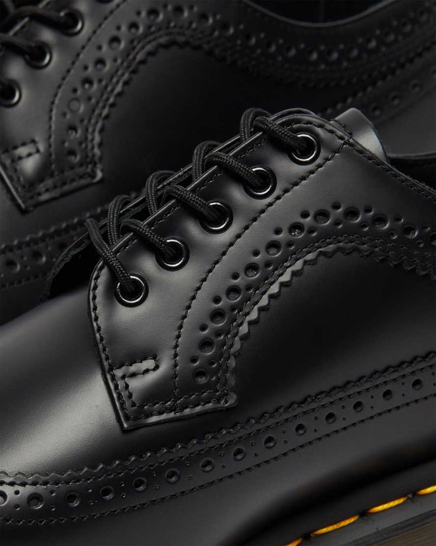 schwarze dr. martens 3989 damen-brogue-schuhe mit gelben nähten