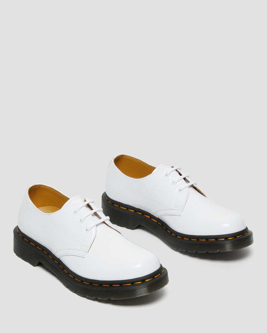 weiße dr. martens 1461 lacklederschuhe mit krokodilprägung für damen