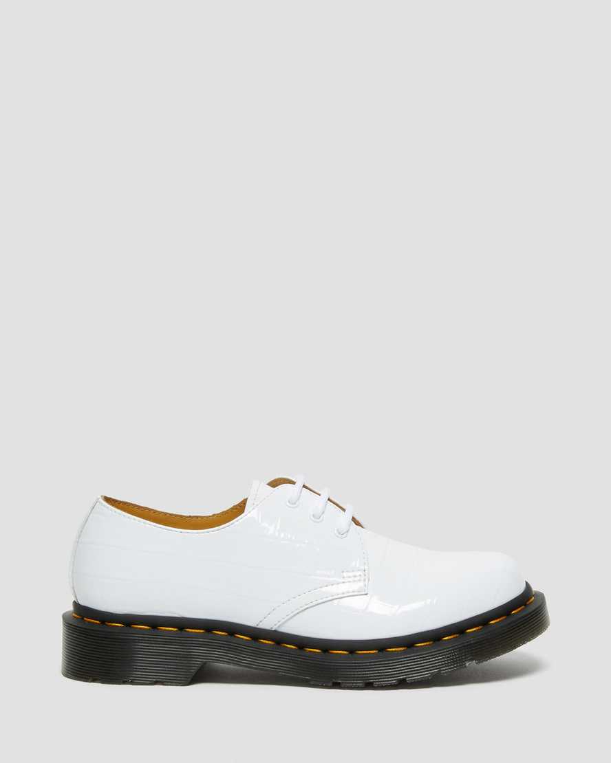 weiße dr. martens 1461 lacklederschuhe mit krokodilprägung für damen