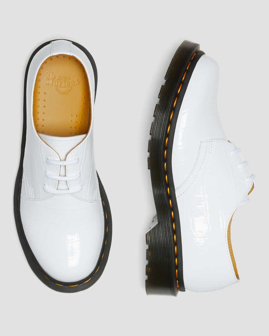 weiße dr. martens 1461 lacklederschuhe mit krokodilprägung für damen