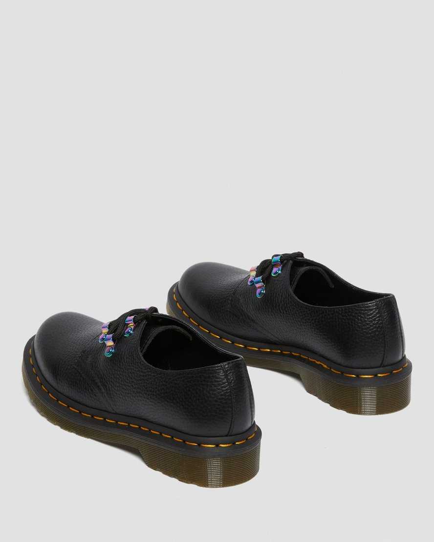 schwarze dr. martens 1461 damen-schnürschuhe mit irisierender hardware