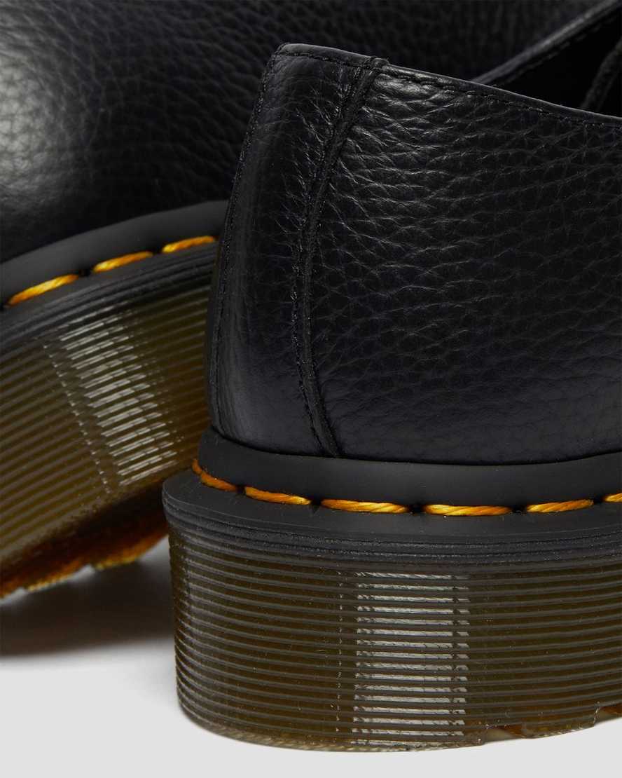 schwarze dr. martens 1461 damen-schnürschuhe mit irisierender hardware