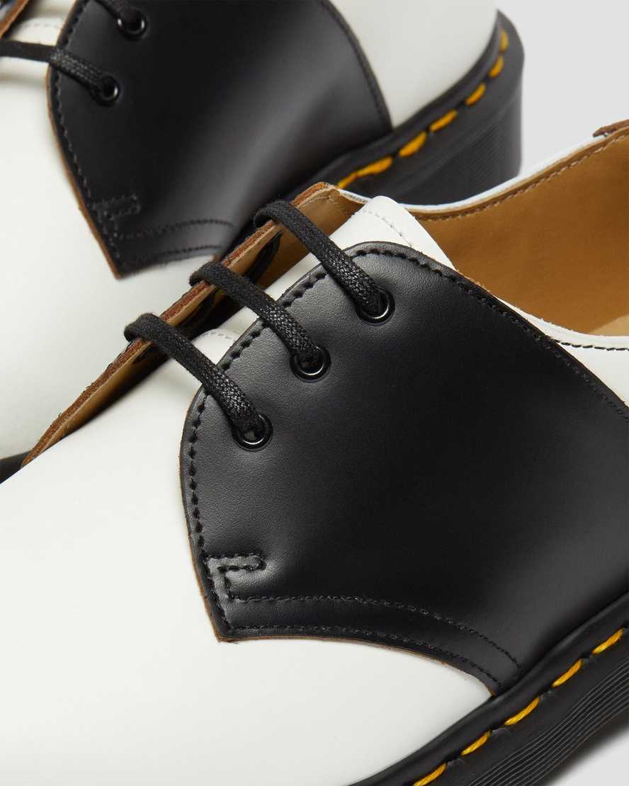 weiße und schwarze dr. martens 1461 damen-sattelschuhe